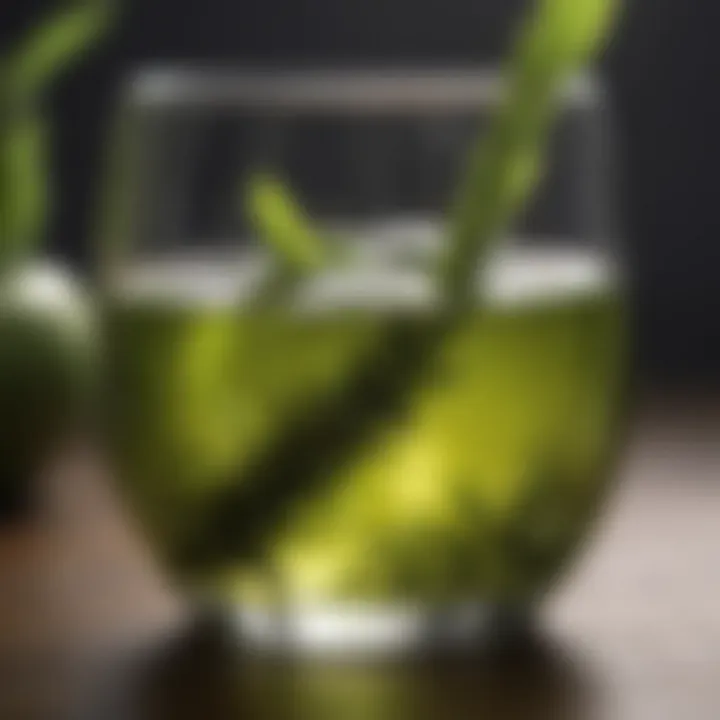 Close-up of brewed green tea in clear glass