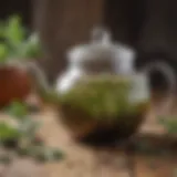 Herbal tea leaves in a vintage teapot on a wooden table