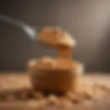 Creamy peanut butter on a spoon