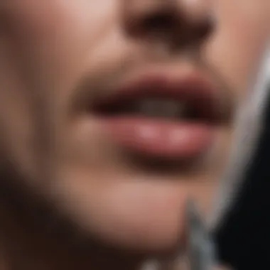 Close-up of pen in hand aiding in stopping bleeding